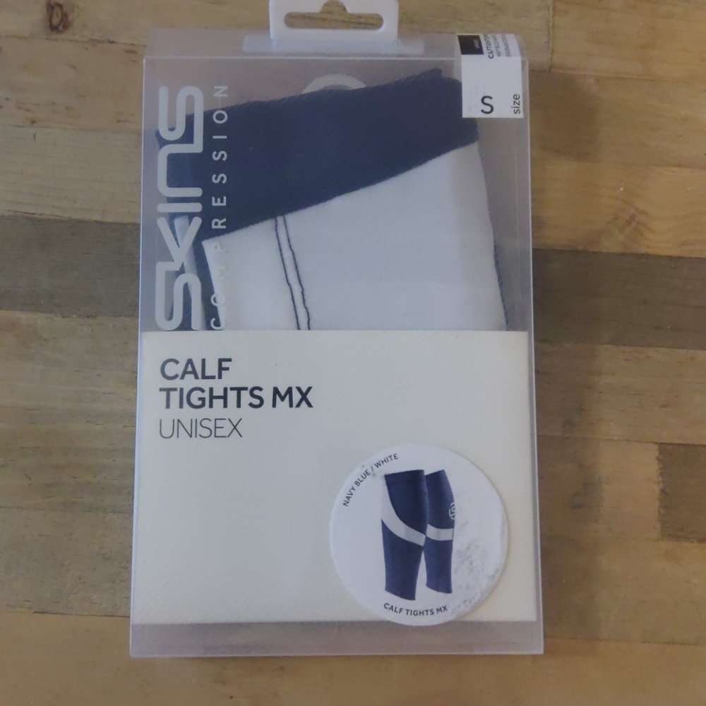 Pair of brand new Skins calf tights MX